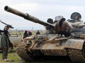 Quốc tế vẫn dè dặt không dám can thiệp võ trang vào Syria như ở Libya