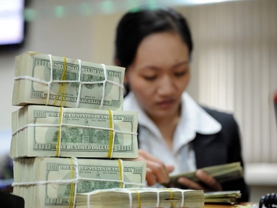 Điều chỉnh tỷ giá có hại thế nào?