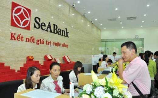 Hạ lãi suất vay vốn ngân hàng: Doanh nghiệp vẫn... khó hấp thụ vốn