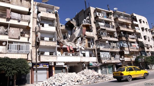 Syria pháo kích thành phố do quân nổi dậy chiếm giữ